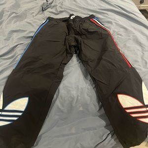 Addidas woven joggers, size large.